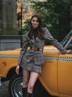 Aansluitende geruite blazer