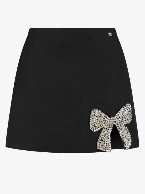 Aansluitende skort met glitter strik