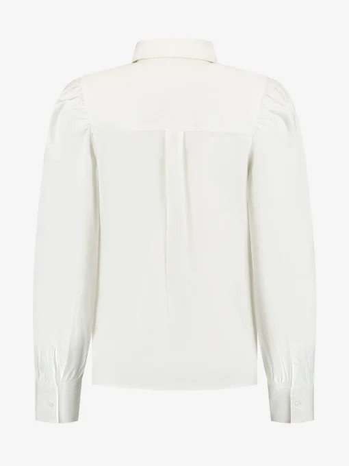 Blouse met bloem detail