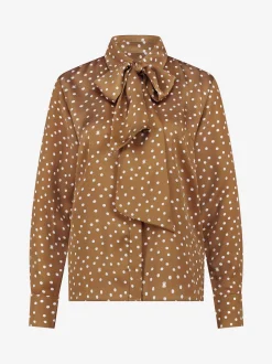 Blouse met stippen en strikkoord