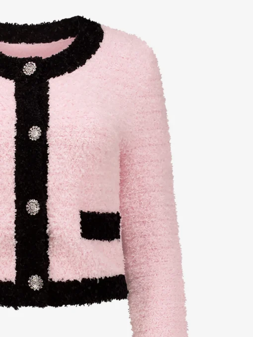 Fluffy vest met sierknopen