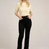 High rise flared jeans met knopen