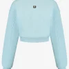 Korte sweater met metalen logo