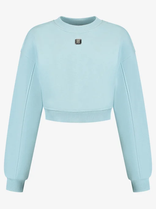 Korte sweater met metalen logo