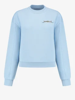 Sweater met ketting detail
