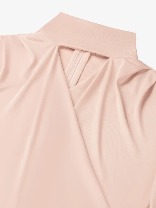 Top met col en open detail bij hals